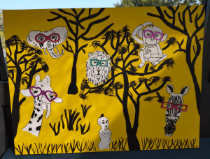 Grande toile, peinture acrylique et collage de papier brillant pour les lunettes des animaux de la savane
